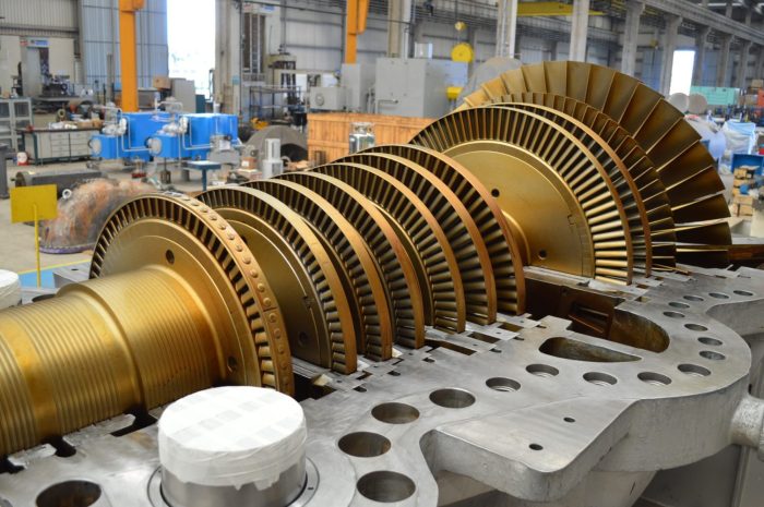 A rotating turbine generates electricity to power a blow-dryer